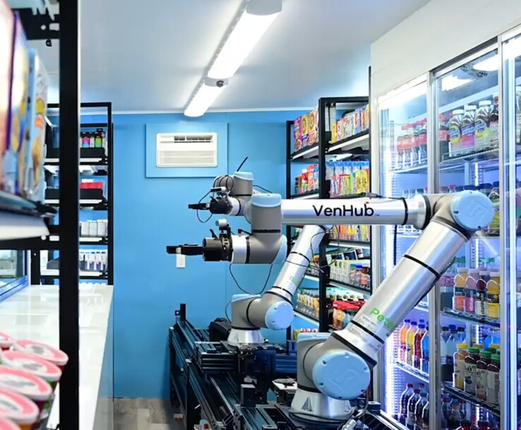 Sklepy Venhub wykorzystują dwa roboty napędzane sztuczną inteligencją, które jeżdżą po długim metalowym torze, aby realizować zamówienia klientów 24/7. (Źródło zdjęcia: Venhub)